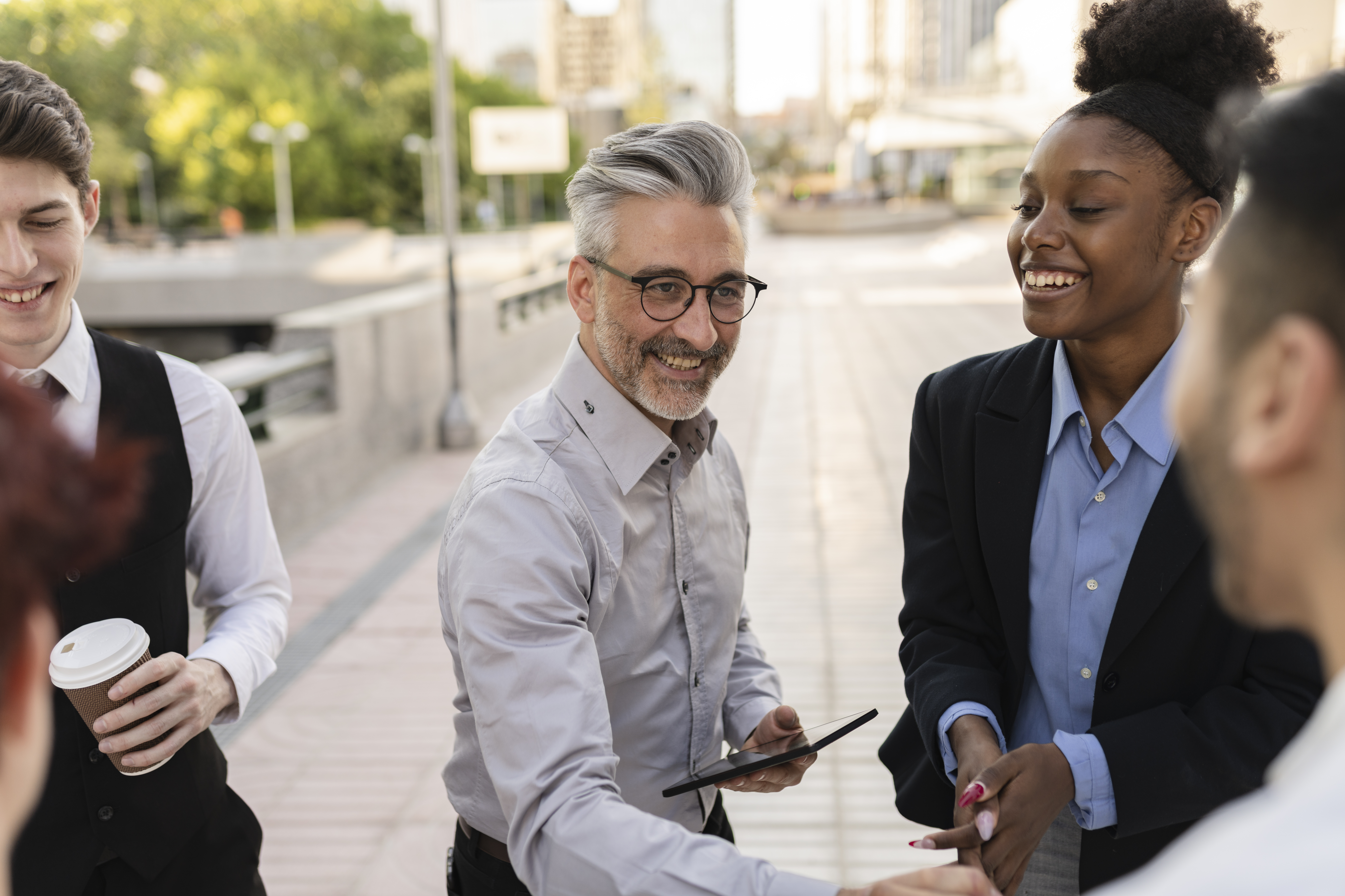 A business professional talking to a customer, providing a great customer experience.